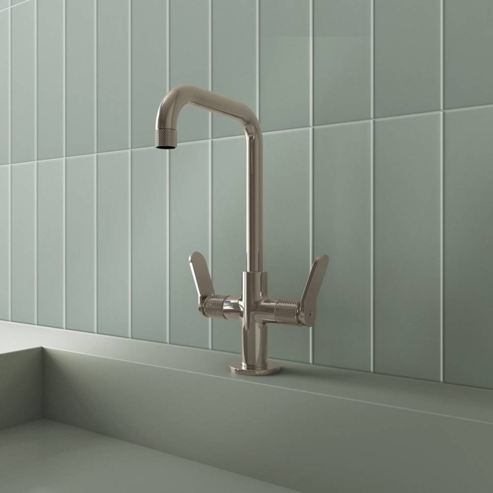 Lifestyle image of the Crosswater Calix Chrome Tall Basin Mixer installed the deck of a basin